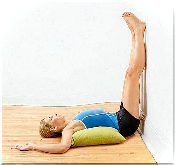 Stretching exercises for leg pain: legs against the wall