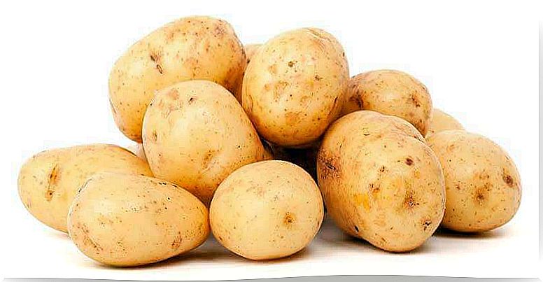 Lots of raw potatoes