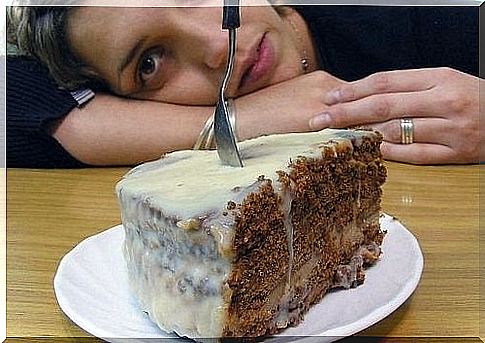 Woman in front of a cake