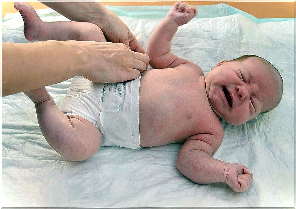 Should you wake your baby to change a diaper?